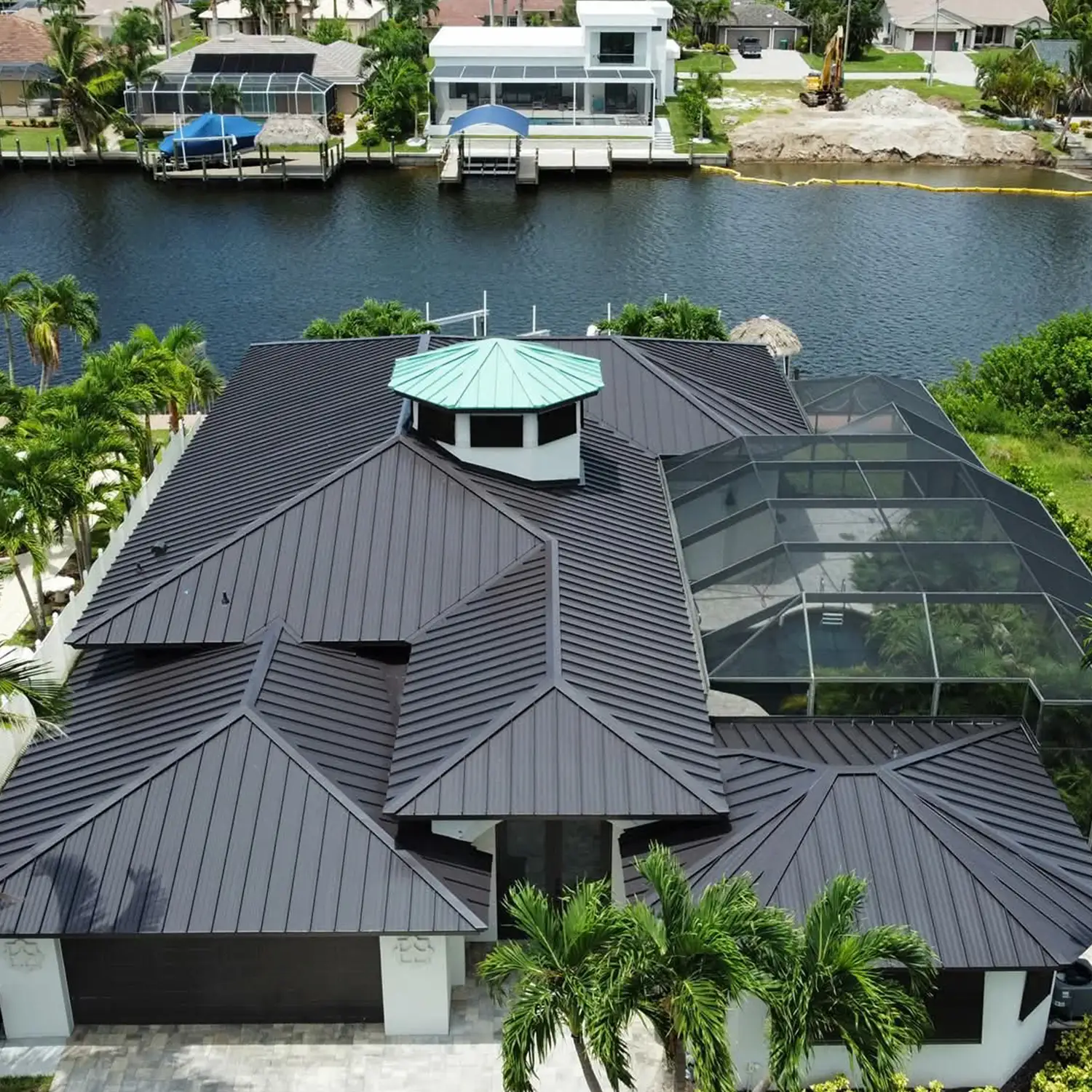 home-hero - Infinity Roofing - A Stronghouse Partner house with new blue siding and roofing